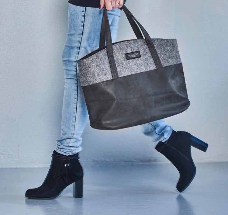 Tilbud og Lagersalg på trendy taske og støvletter i sort og grå, perfekt til hverdagens gøremål.