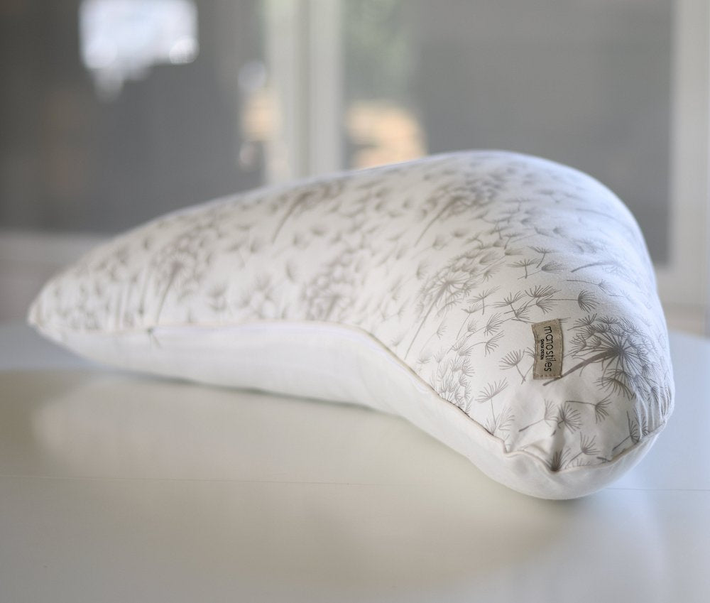 Ammepude i hvid med dandelion mønster set fra siden